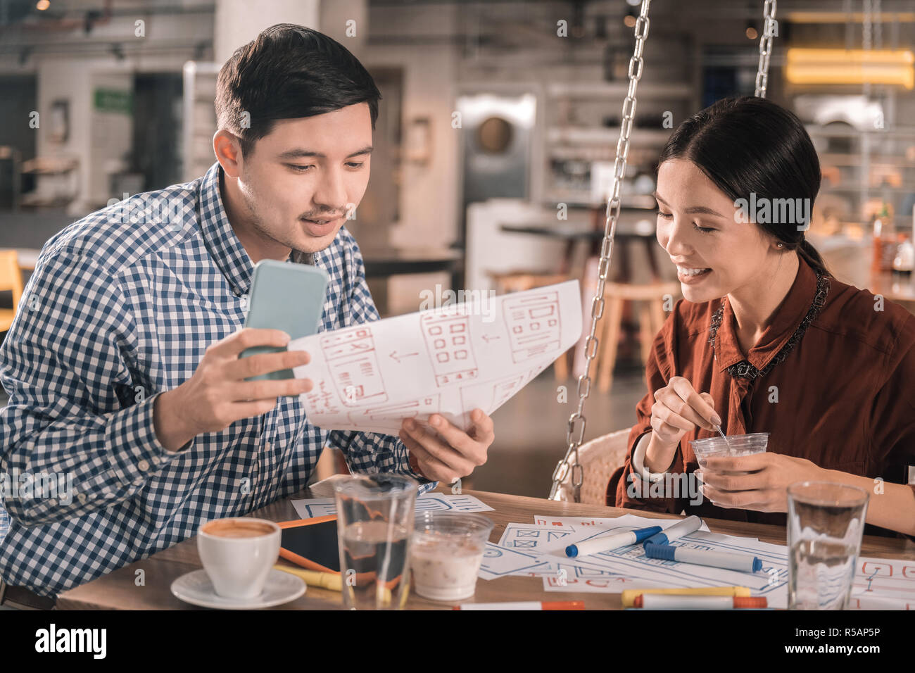 Two creative professional interior designers working on new project Stock Photo