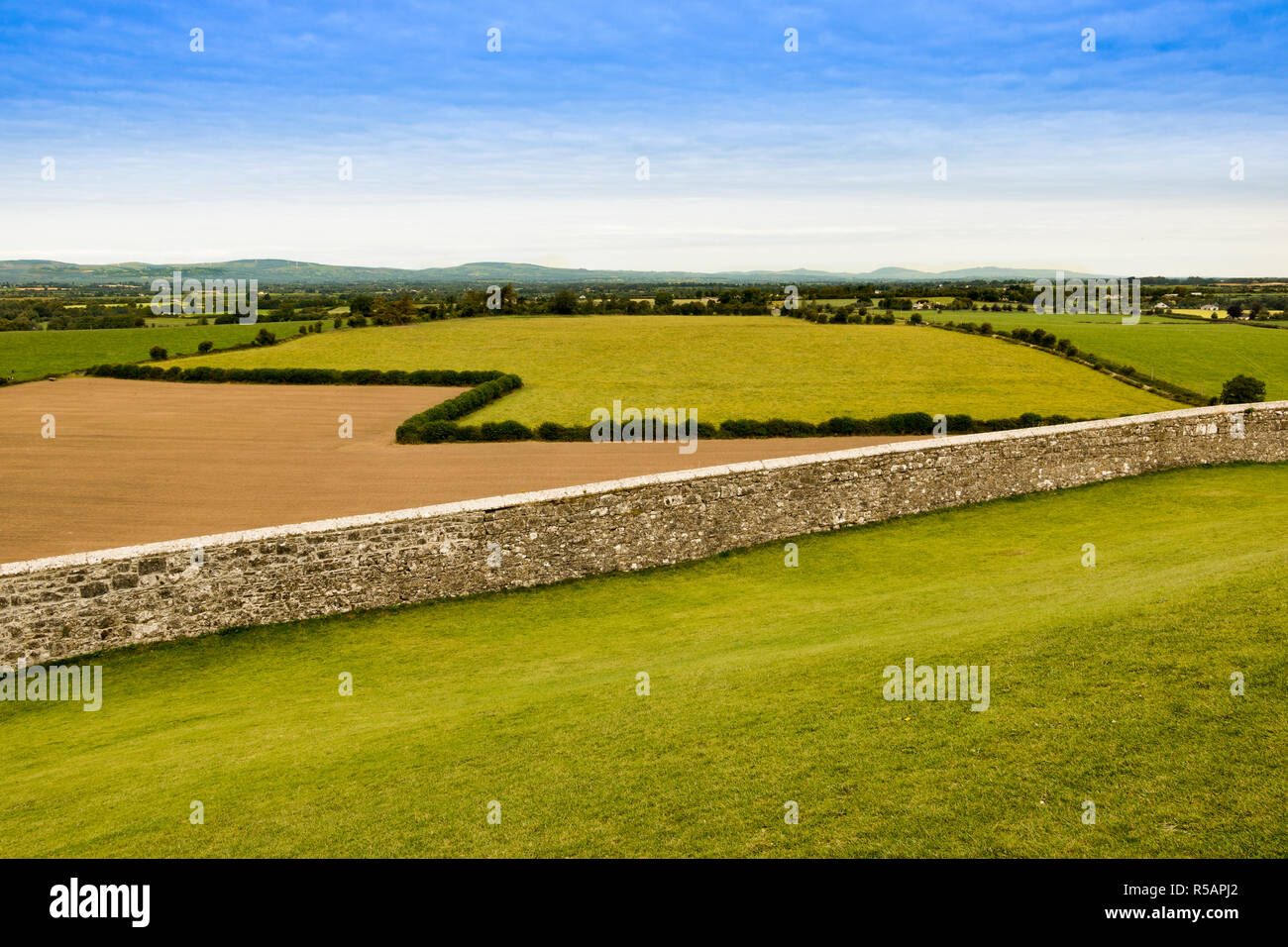 Irish countryside outside Cashel with the pastures broken up by rows of
