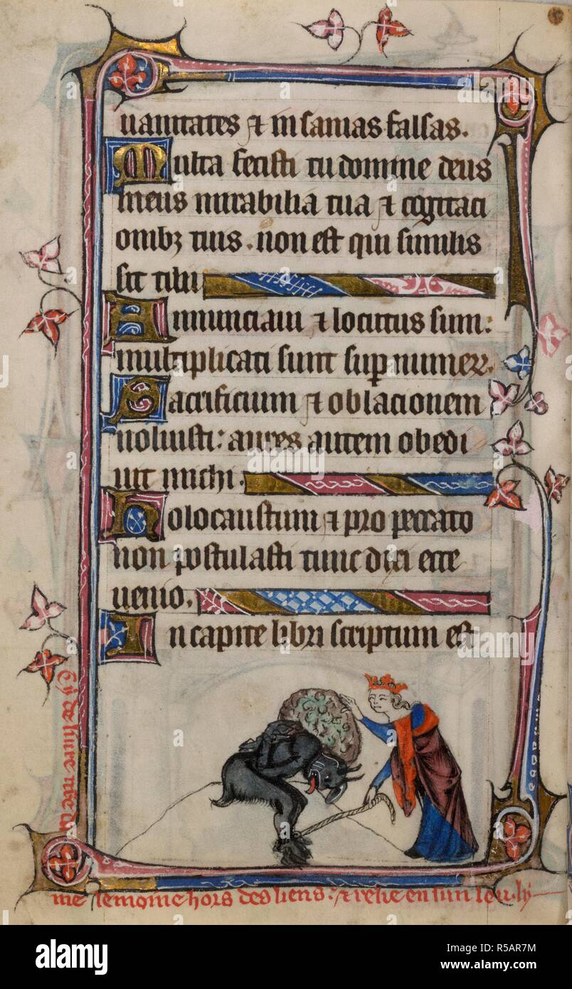 Bas-de-page scene of the Virgin Mary pulling a cord that binds the hands and feet of a devil sitting on a small hill, with a caption reading, â€˜Cy deliure n[ost]re dame le moine hors des liens et relie en sun leu lyâ€¦â€™. Book of Hours, Use of Sarum ('The Taymouth Hours'). England, S. E.? (London?); 2nd quarter of the 14th century. Source: Yates Thompson 13, f.173v. Language: Latin and French. Stock Photo