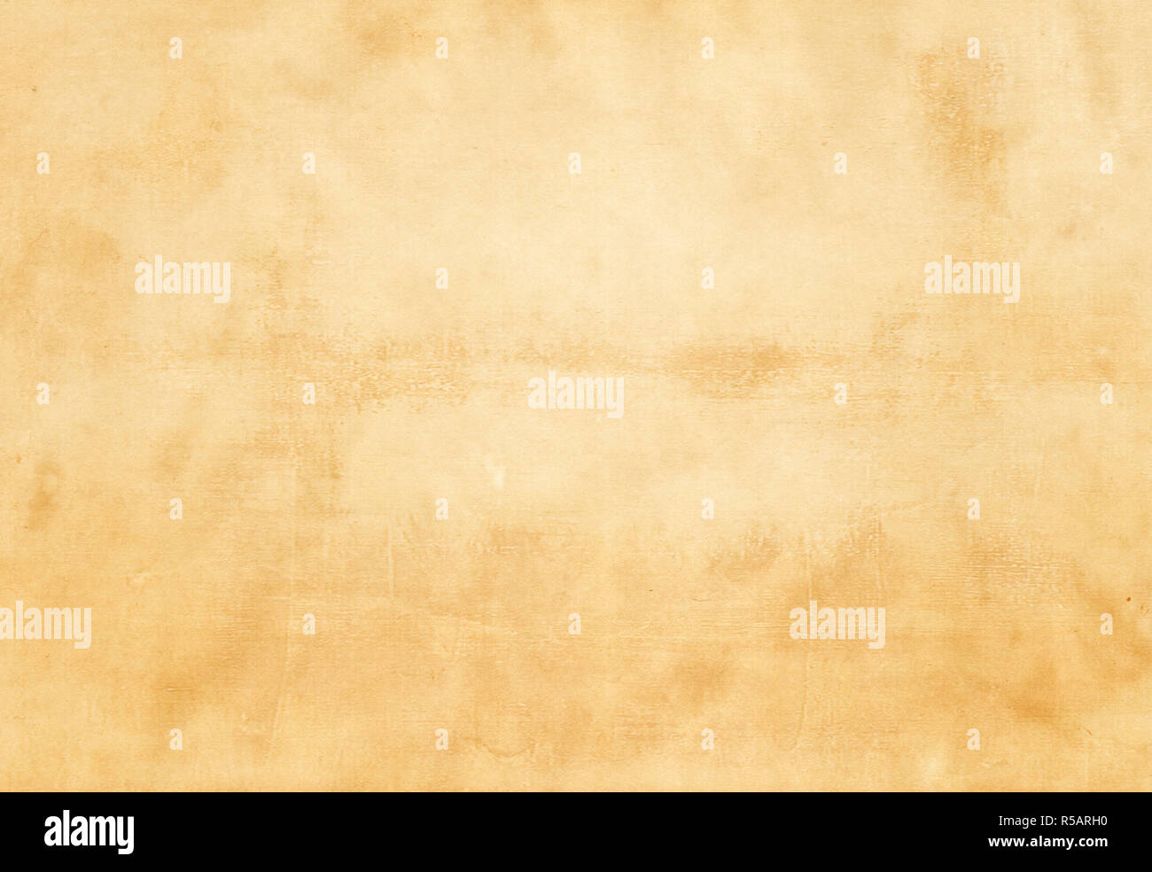 Old yellowed and dirty paper texture for design. Grunge paper Stock
