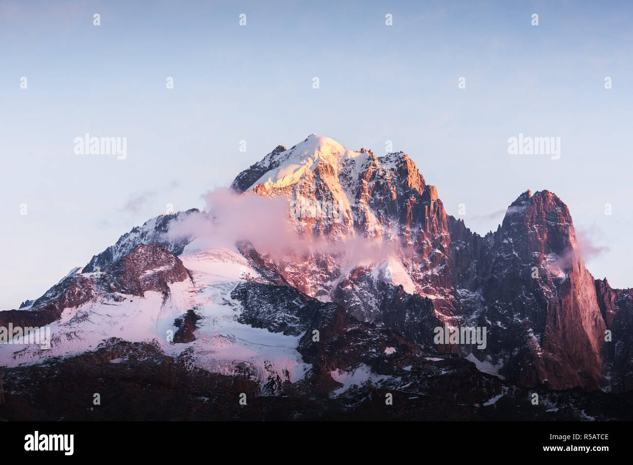 Incredible colorful sunset on Aiguille Verte peak in French Alps. Monte Bianco range, Mont Blank massif, France. Landscape photography Stock Photo