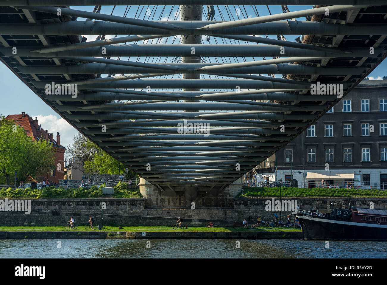 The Father Bernatek Footbridge connects the districts of Kazimierz and Podgórze with each other, Kraków, Poland Stock Photo