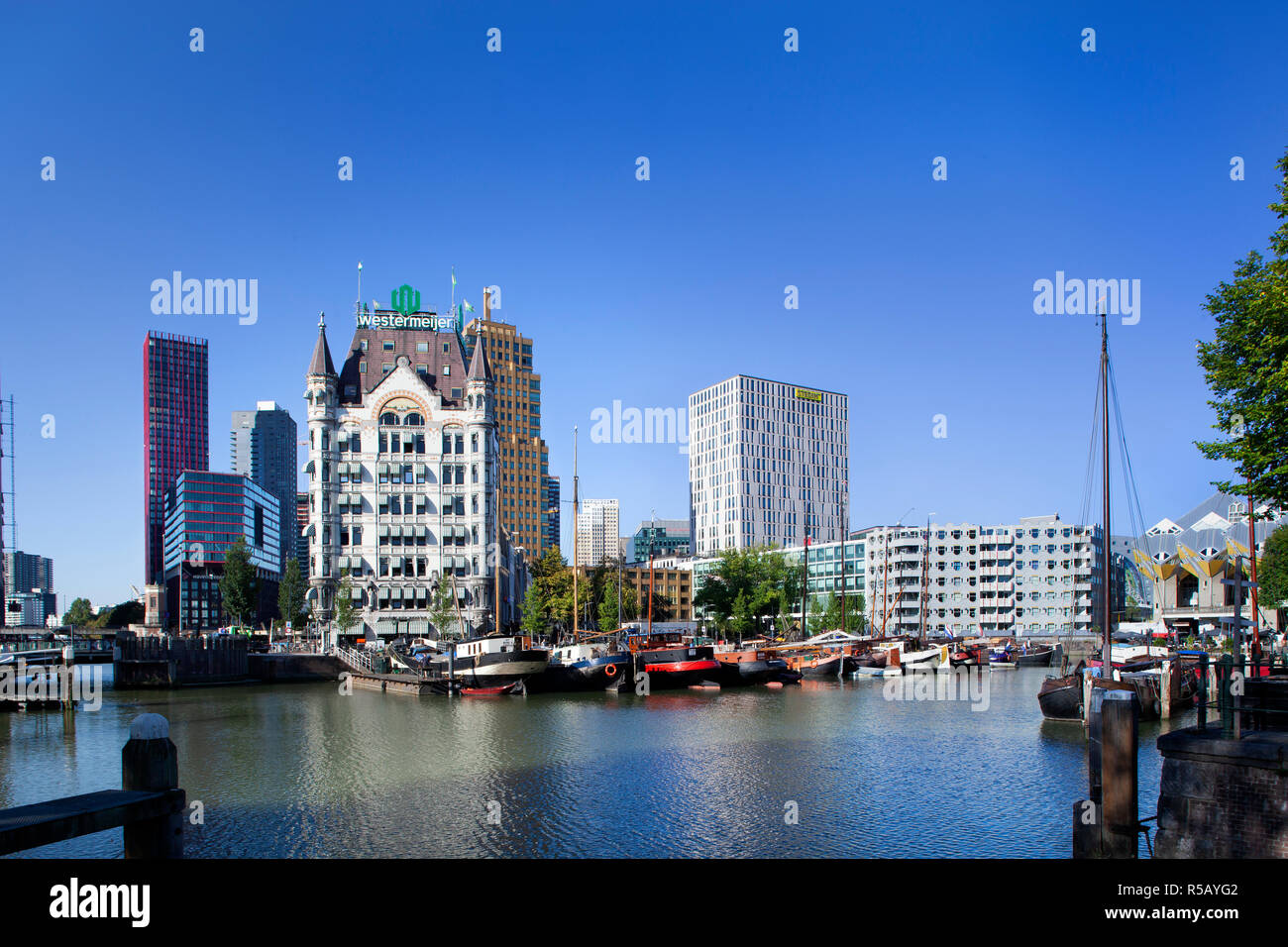 Rotterdam, Netherlands – September 18, 2018: Historical ships moored in the Oude Haven in Rotterdam with the Witte Huis or white house on the left and Stock Photo