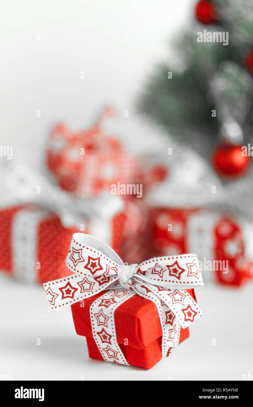 Red Christmas gift boxes on white background Stock Photo - Alamy
