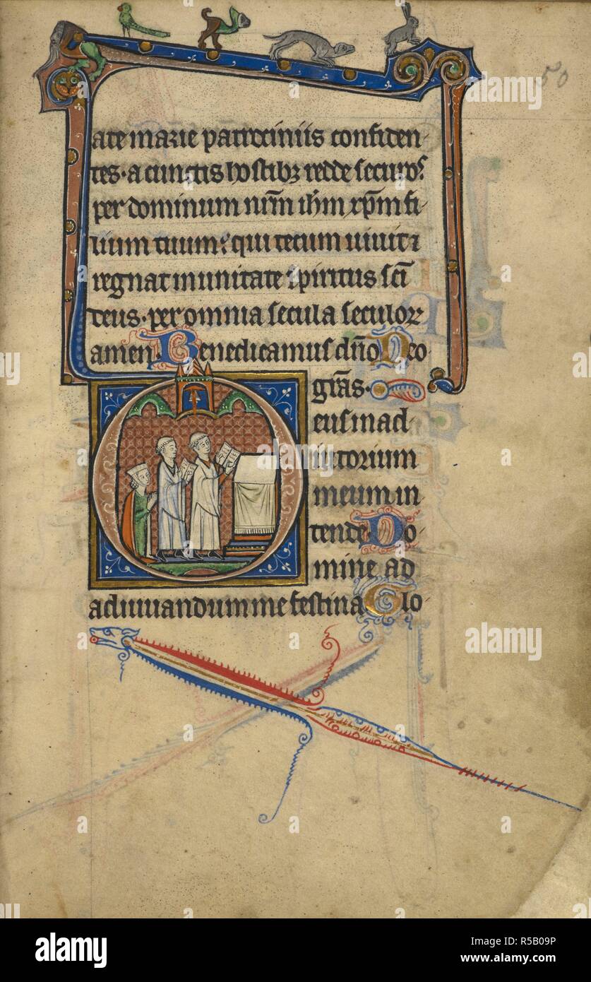 Historiated initial 'D'(eus) with a kneeling woman behind two clerics who hold open books before an altar draped with white, and on the bar border, a bird, a hybrid creature, and dog looking at a rabbit, at the beginning of Vespers. Book of Hours, including Hours of the Holy Spirit and of the Passion. England, S. or Central (Oxford or West Midlands?); 3rd quarter of the 13th century. Source: Egerton 1151, f.50. Language: Latin, some rubrics in French. Stock Photo