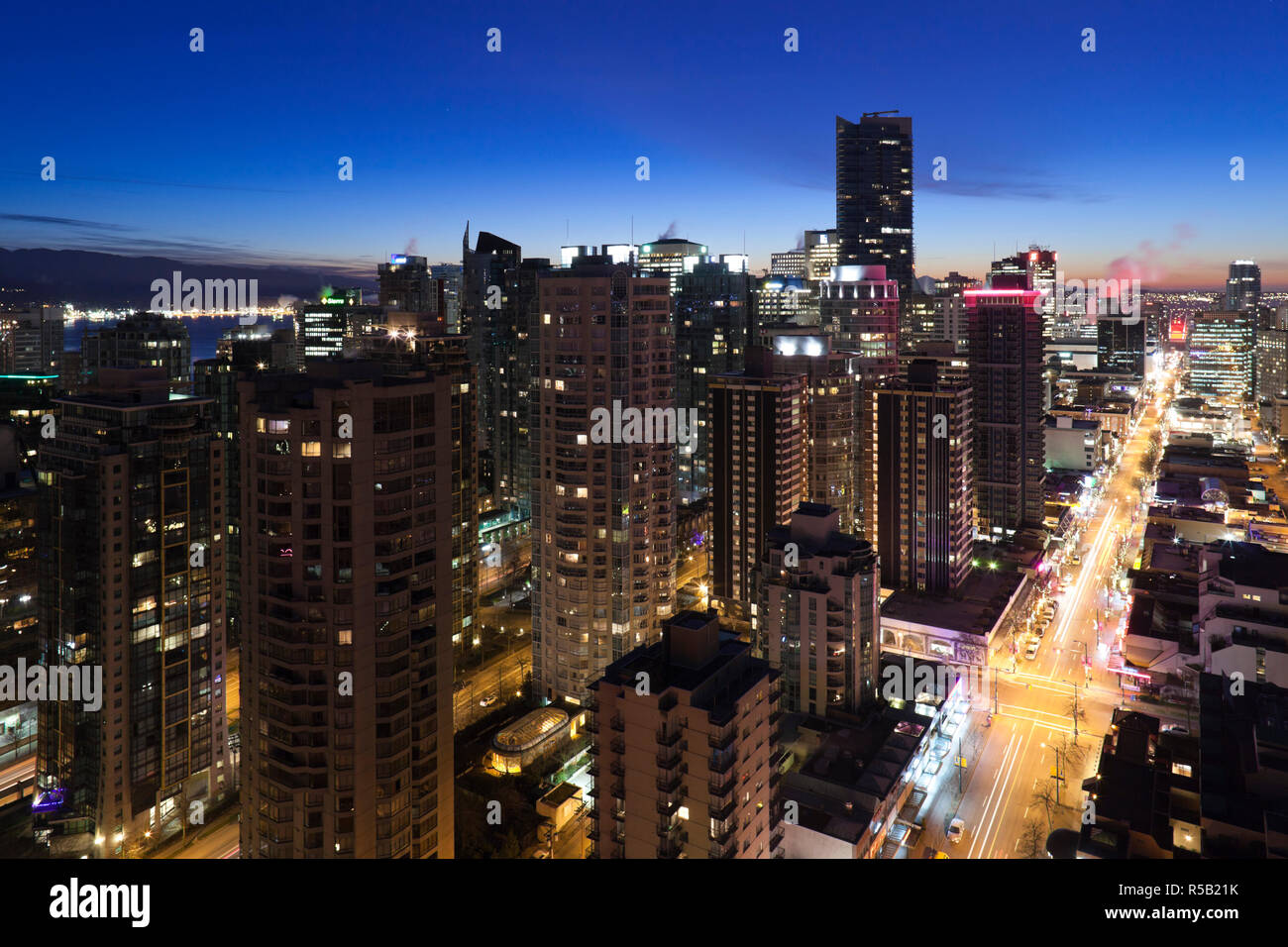 Canada, British Columbia, Vancouver, elevated view West End buildings along Robson Street, dawn