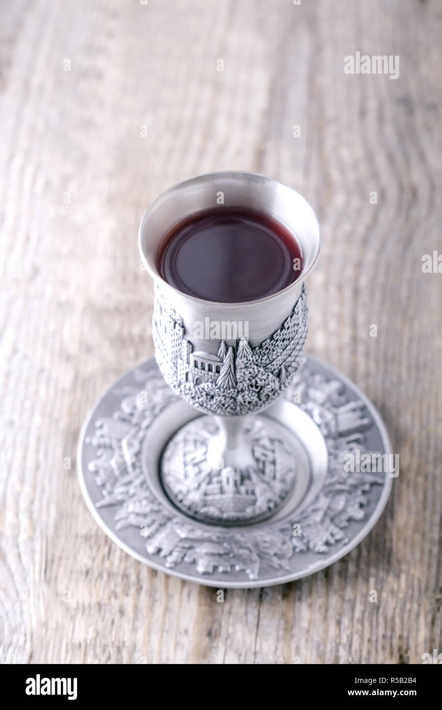 Kiddush cup with wine Stock Photo