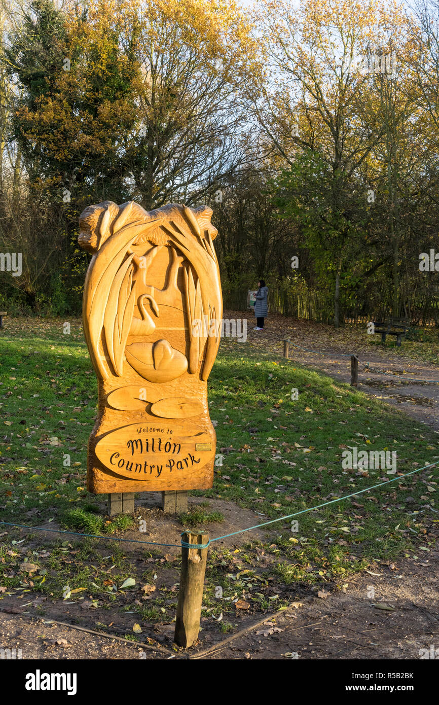 Milton Country Park carved wooden welcome sign Stock Photo