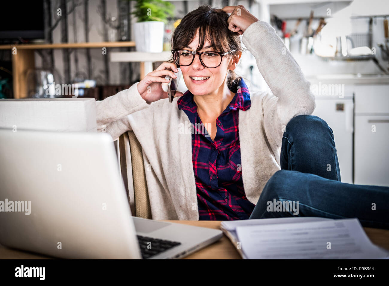 Woman with laptop computer inside mobile home hi-res stock photography ...