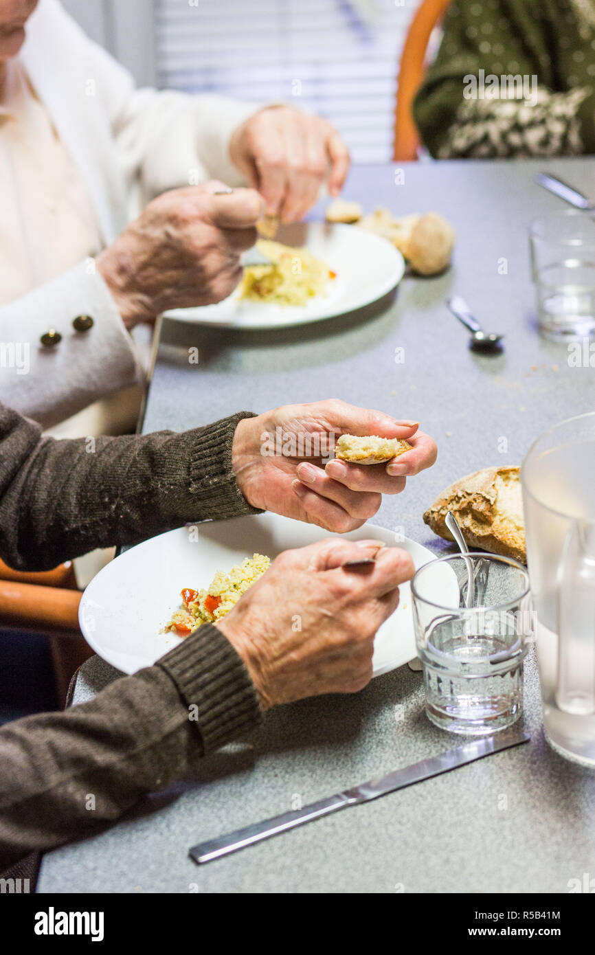 Elderly person eating Stock Photo Alamy
