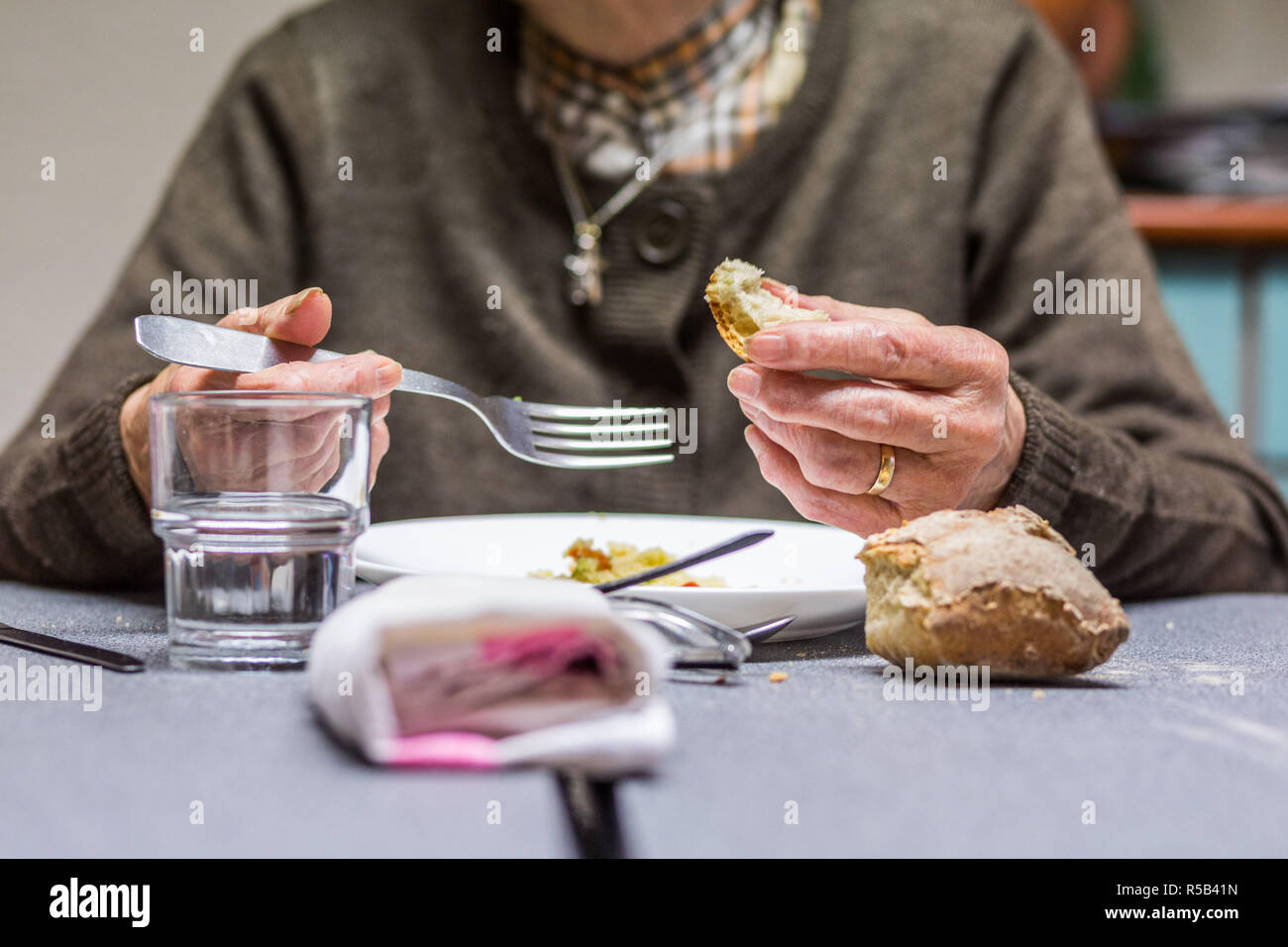 Elderly person eating. Stock Photo
