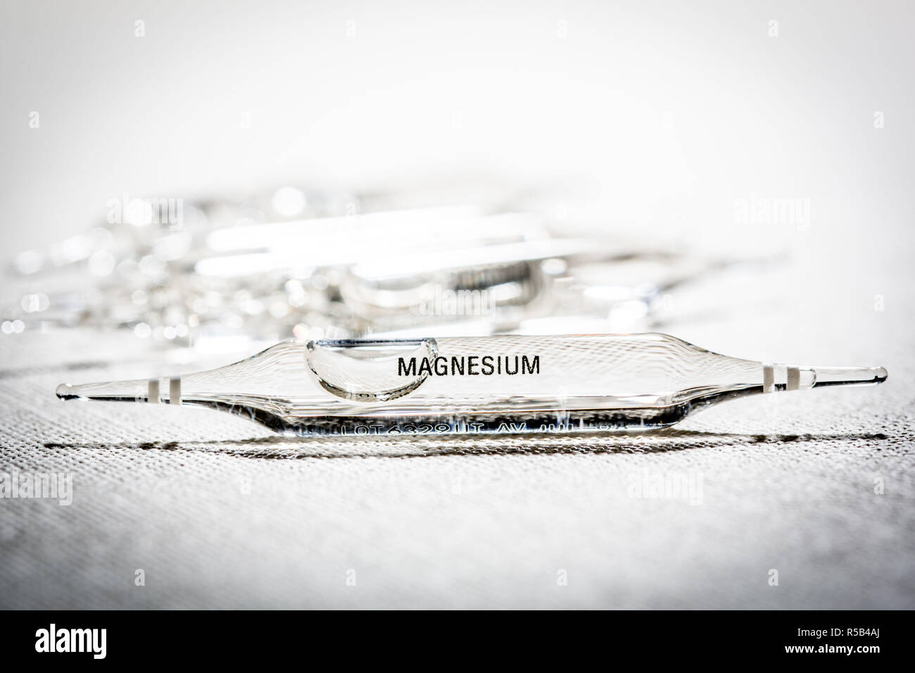 Magnesium glass ampoule. Stock Photo