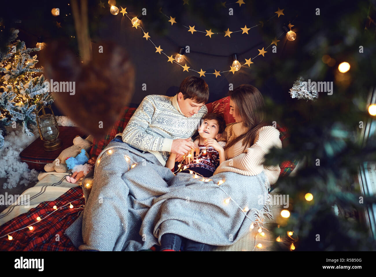 Happy family at home on Christmas.  Stock Photo