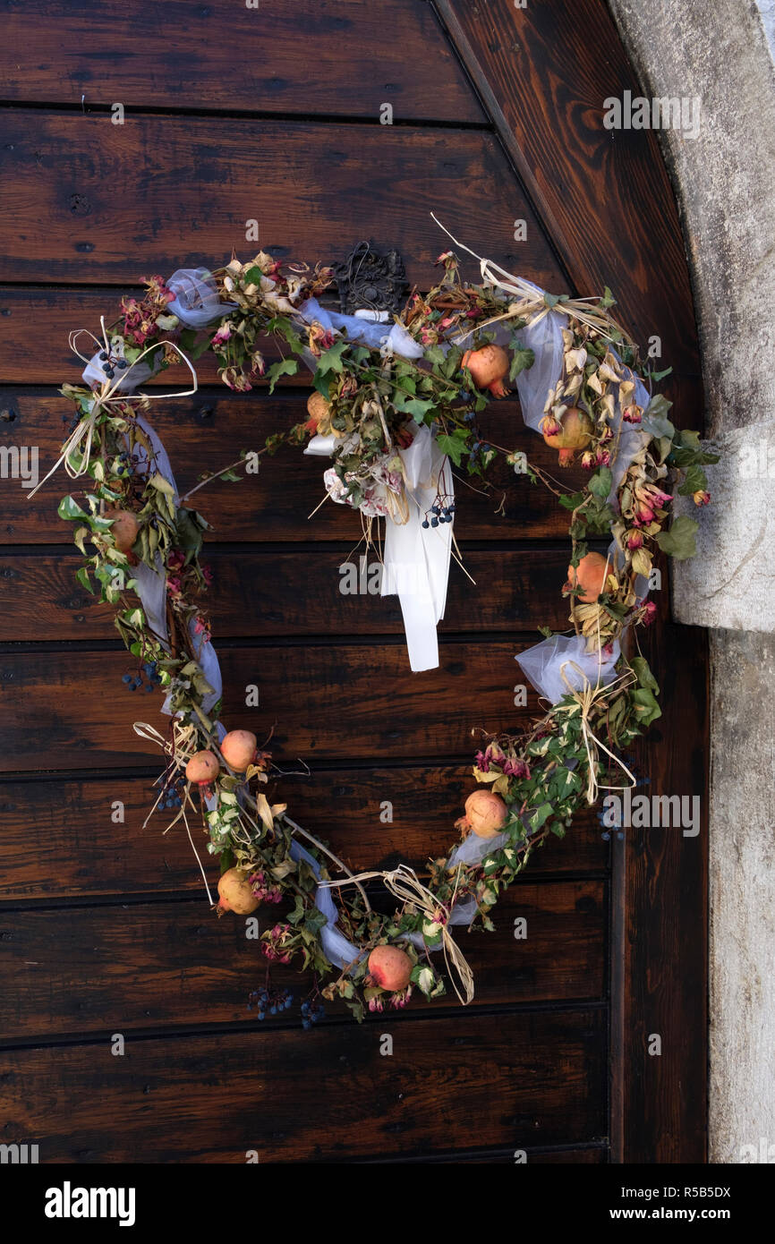 Flower wreath in heart shape, Canale di Tenno, Lake Garda, Trento province, Trentino, Italy Stock Photo