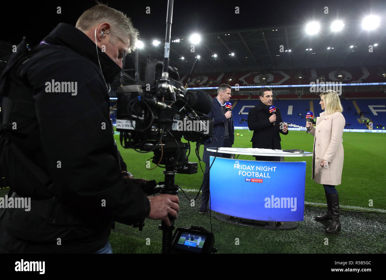 Sky Sports pundits Jamie Carragher (left) and Gary Neville (centre) alongside presenter Kelly Cates before during the Premier League match at Cardiff City Stadium