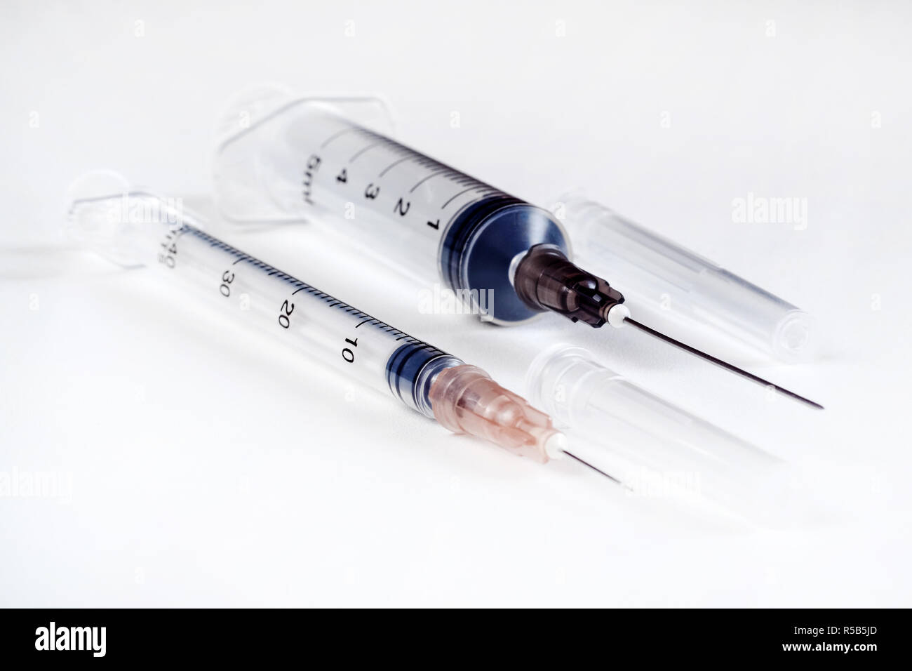 Disposable syringe. Plastic insulin syringe. The insulin syringe with