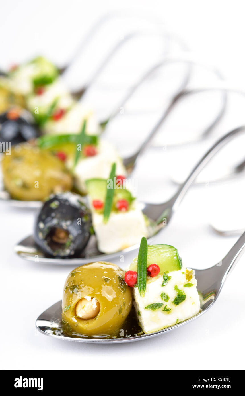 Greek appetizers Fine stuffed green and black olives, feta, cucumber