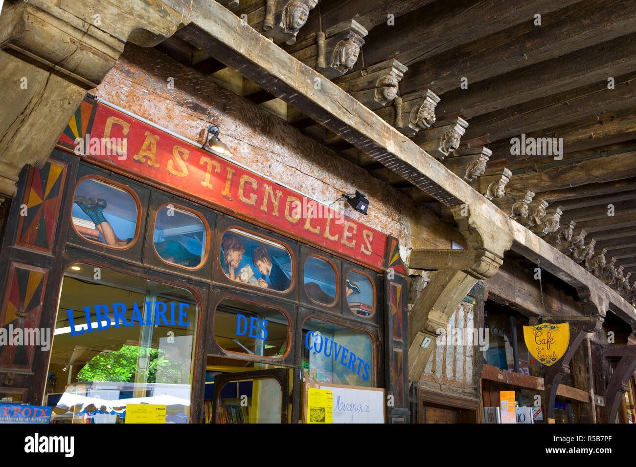 Book Shop & Carved Arcade Rafters, Maison des Consuls, Mirepoix, Ariege, Pyrenees, France Stock Photo