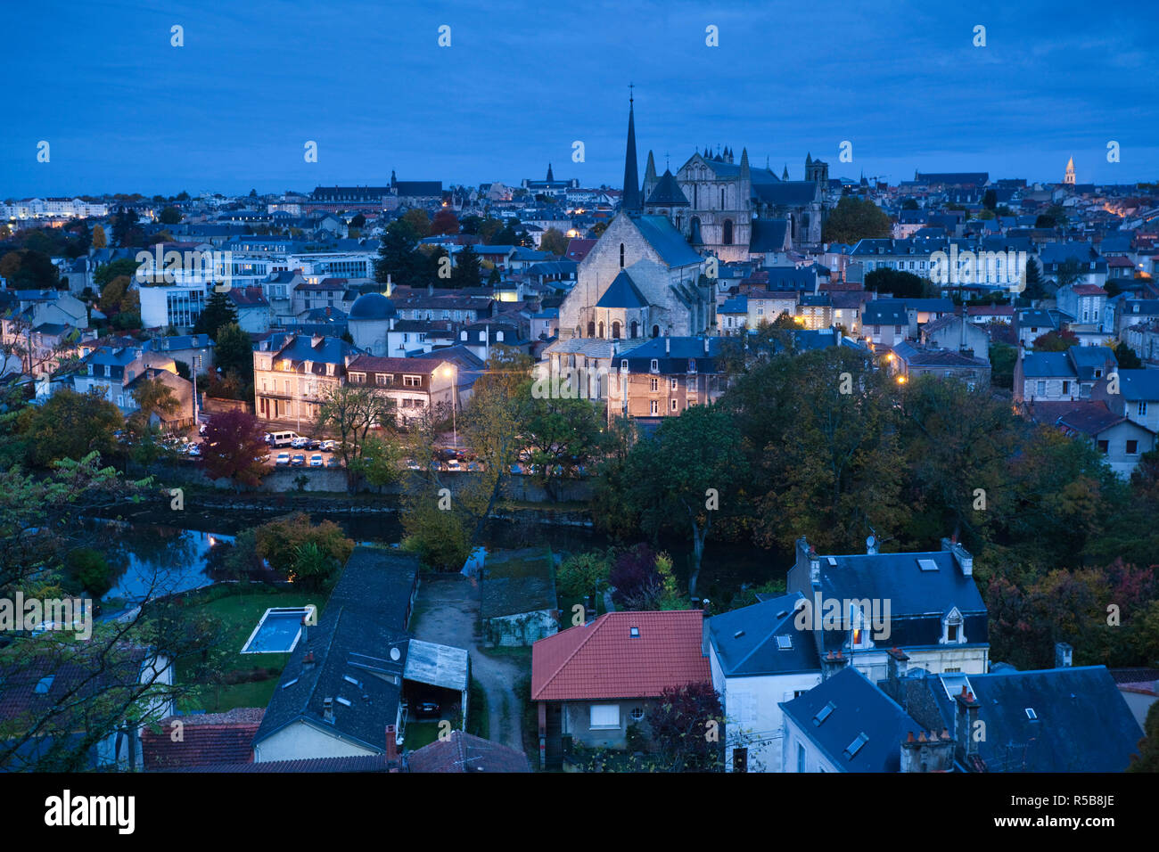 France, Poitou-Charentes Region, Vienne Department, Poitiers, elevated view of town and Cathedrale St-Pierre, dawn Stock Photo