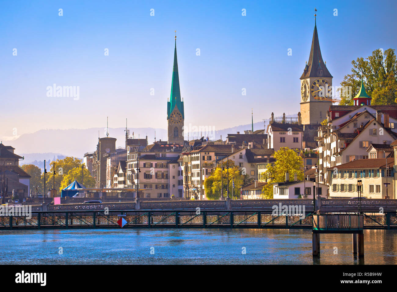 Zurich idyllic waterfront and towers view, largest city in Switzerland