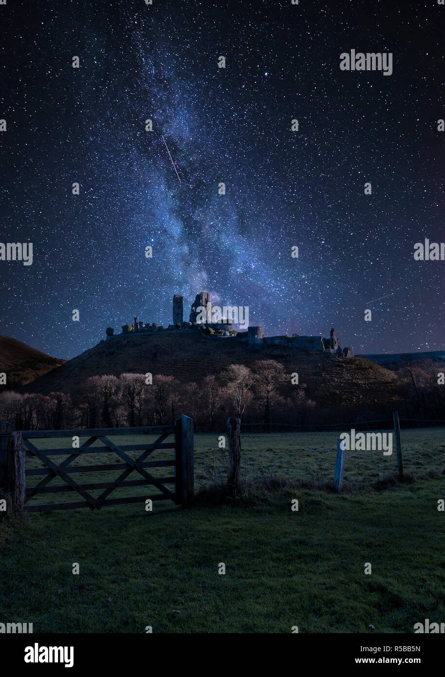 Stunning vibrant Milky Way composite image over landscape of Medieval ...