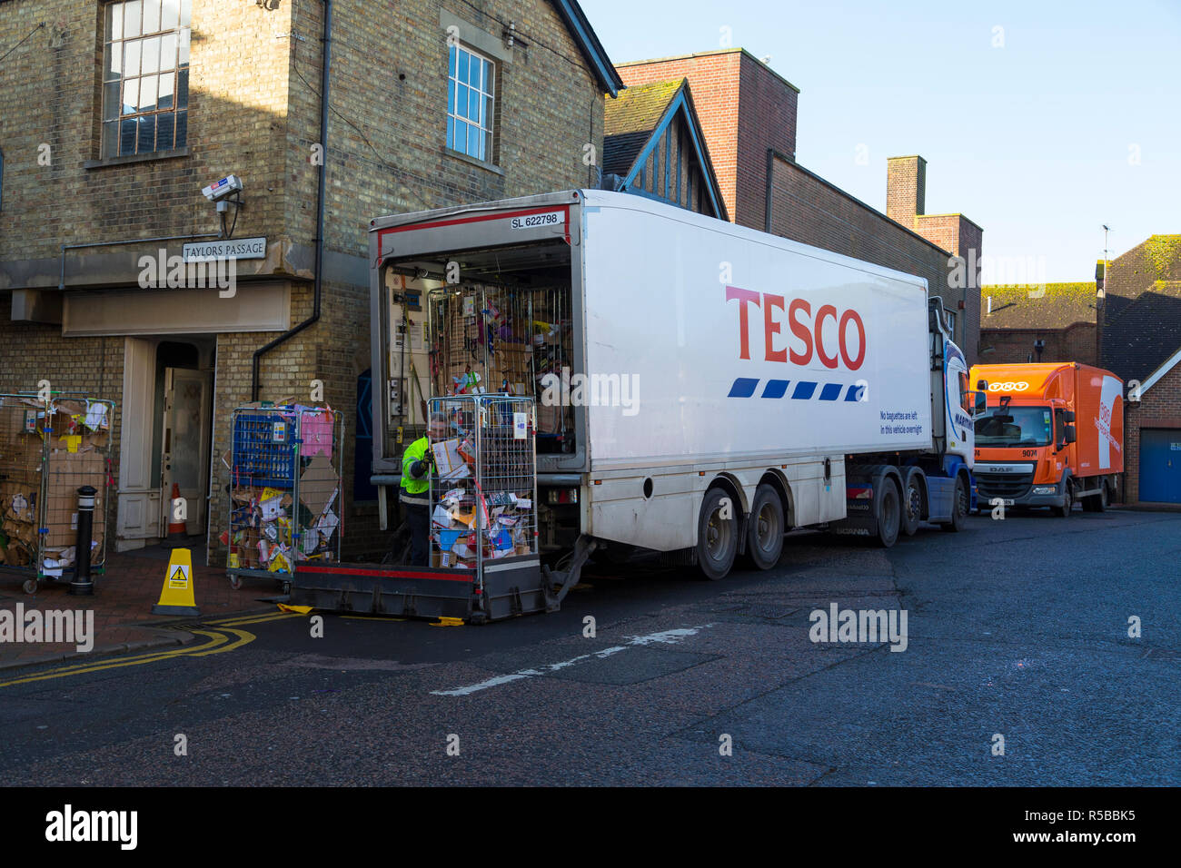 Tesco container lorry being loaded with waste cardboard, ashford, kent, uk Stock Photo