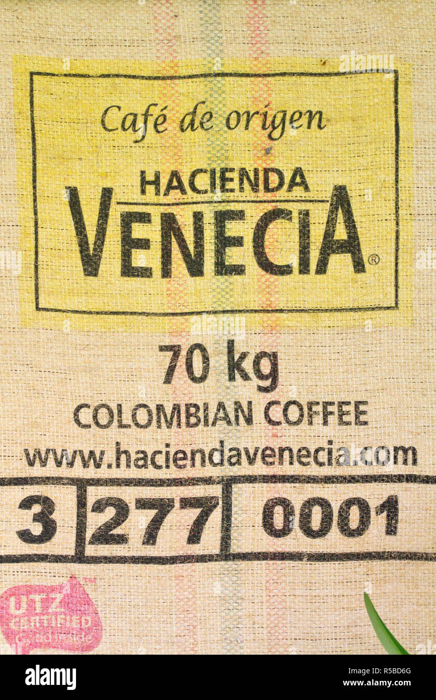 Colombia, Caldas, Manizales, Hacienda Venecia Coffee plantation, Coffee sack on wall of  Hacienda Venecia, Stock Photo
