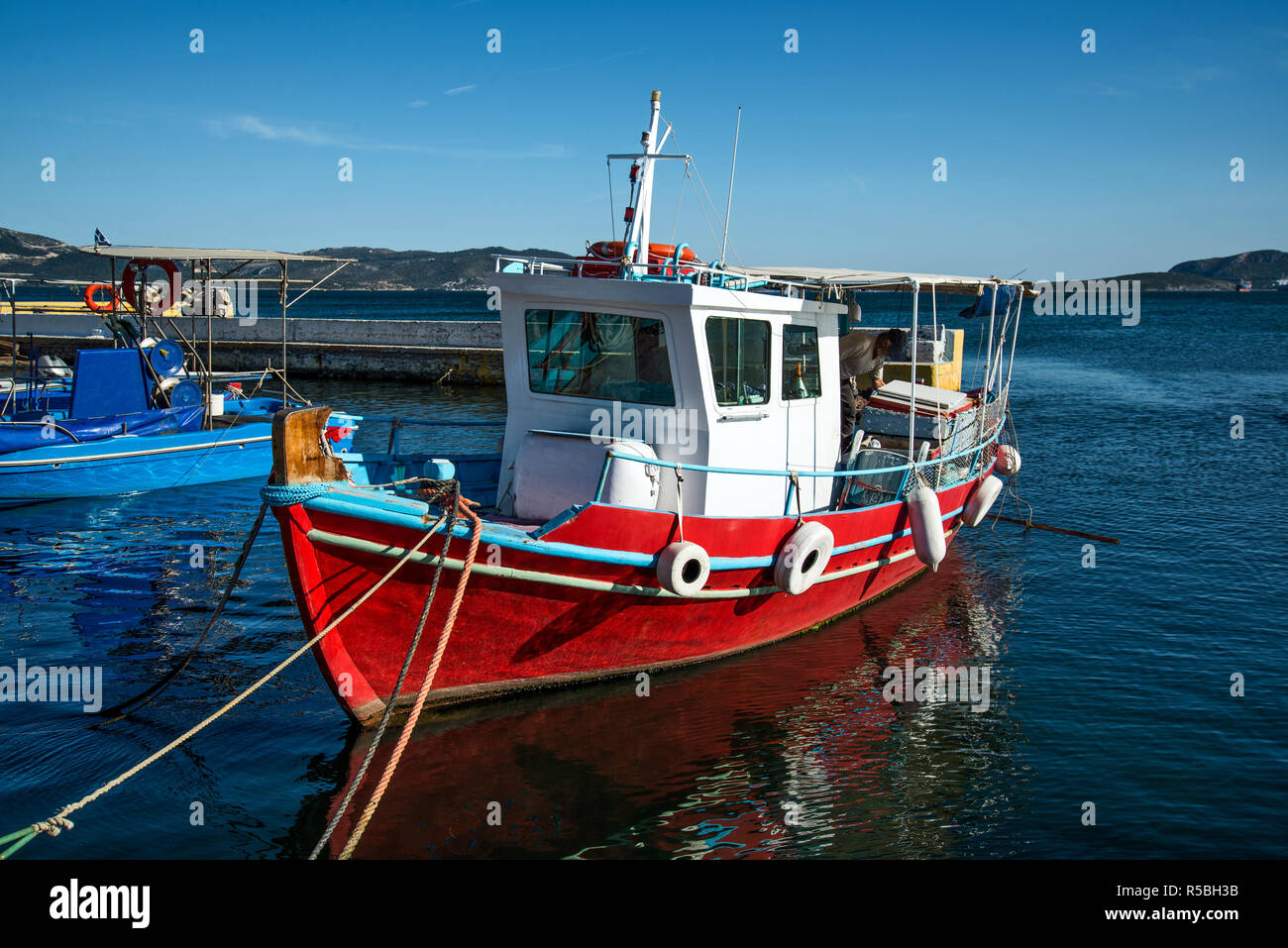 Traditional wooden fishing boat in the port of Elefsina, Greece Stock Photo  - Alamy