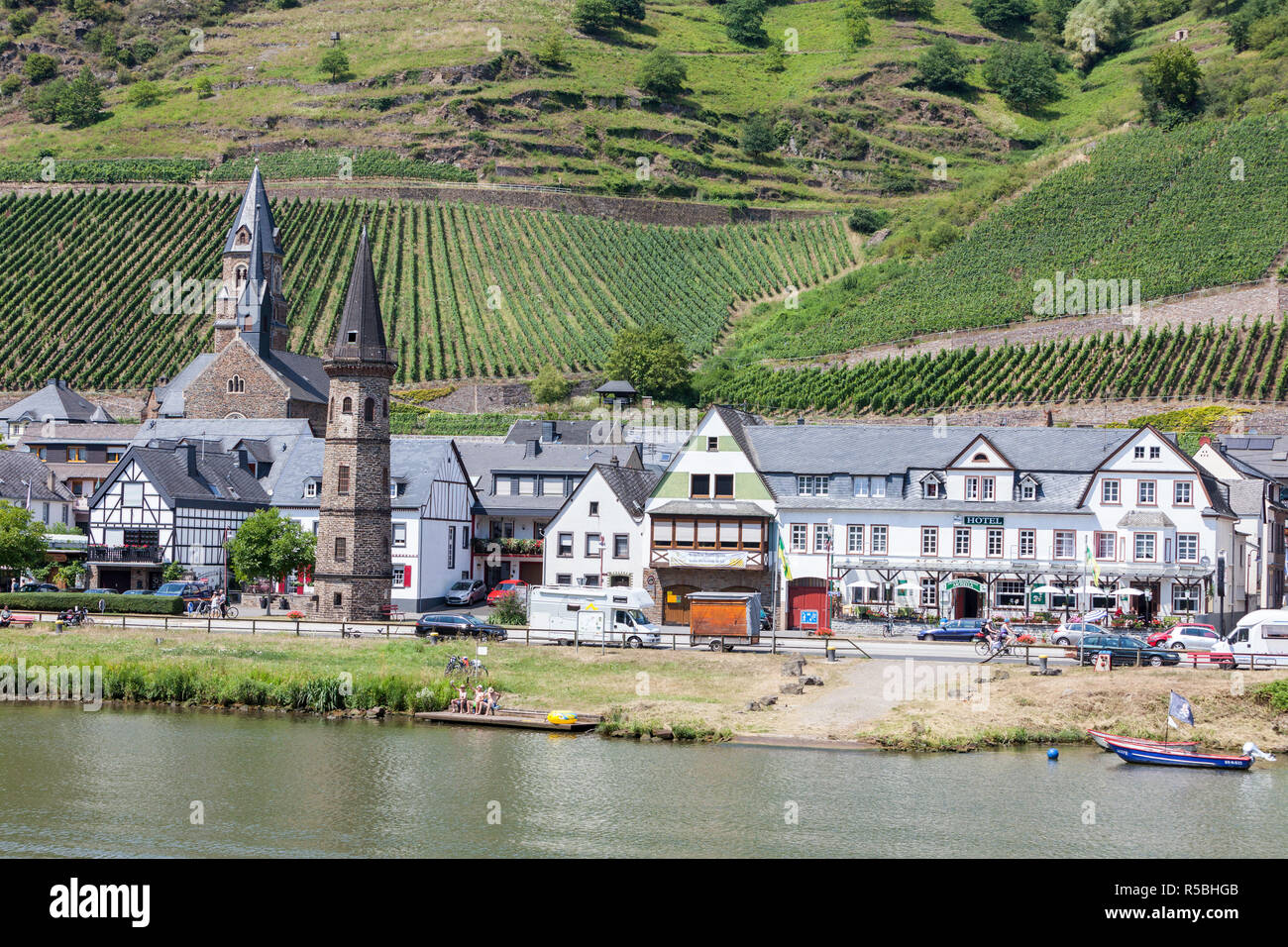 Hatzenport, Germany, on the Moselle.  Vineyards on Hillsides behind the Town. Stock Photo