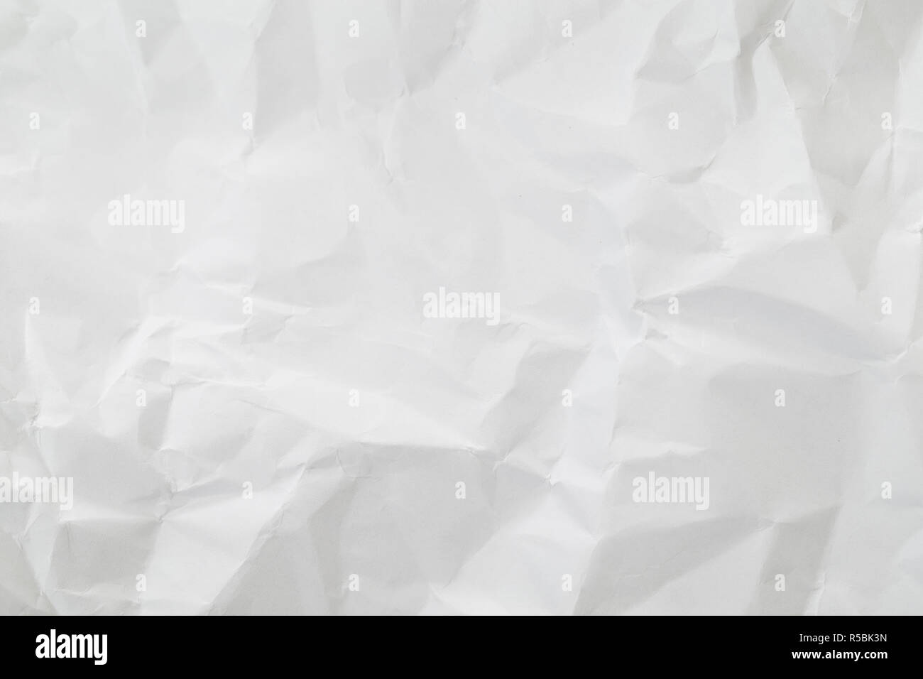 Crumpled white paper background Stock Photo