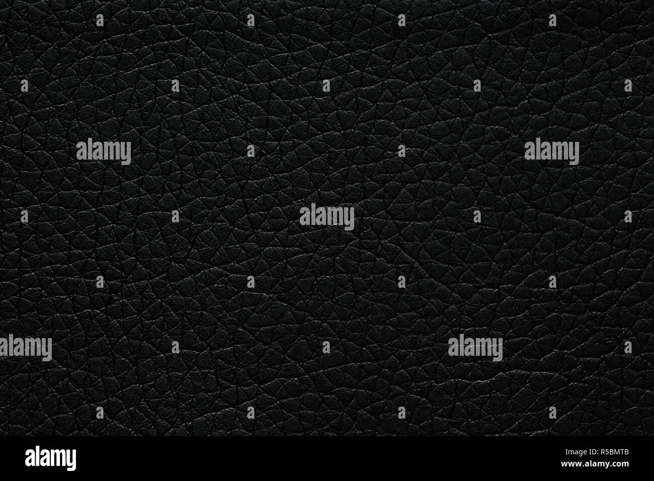 Stylish dark leatherette background for your design. Stock Photo