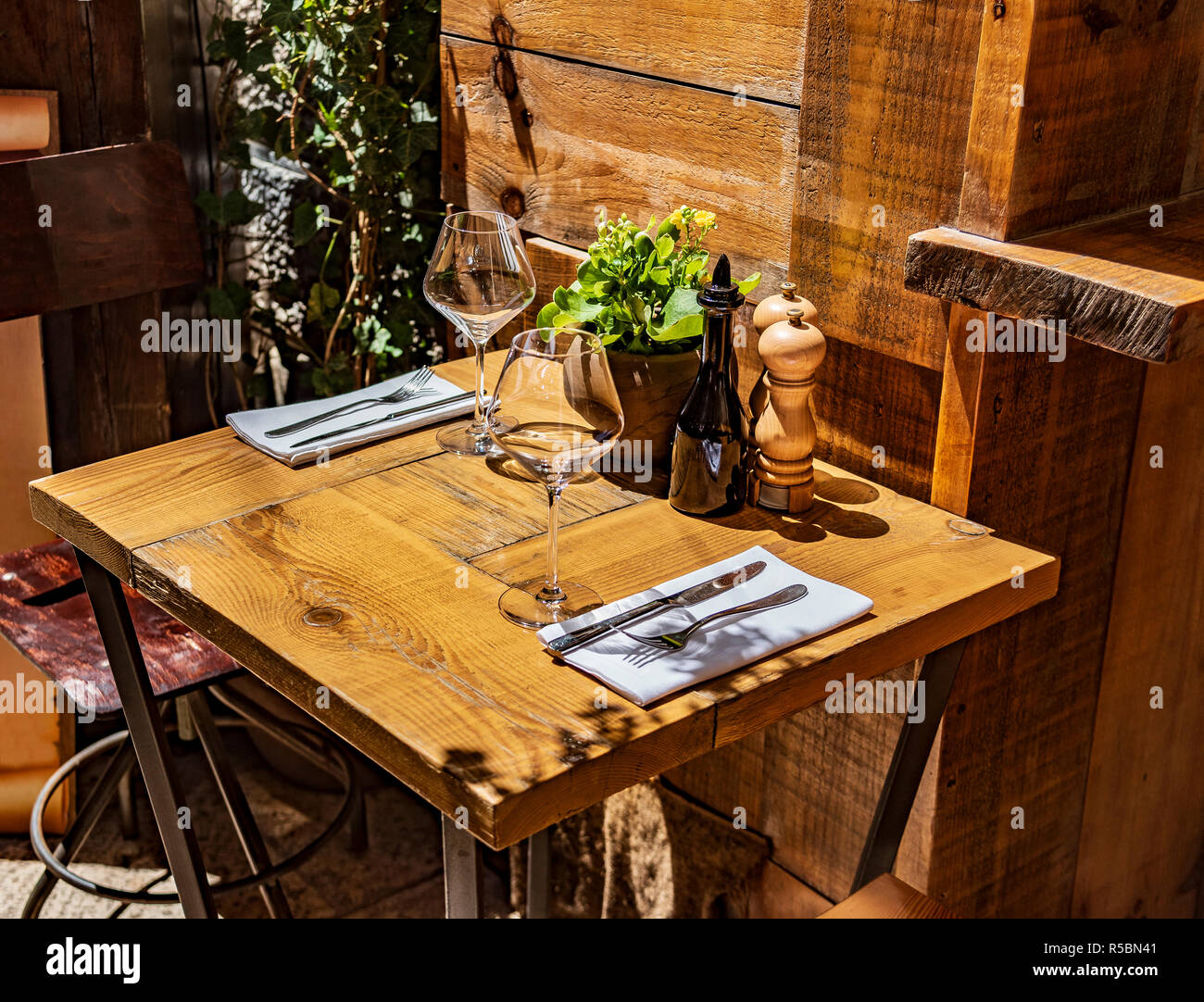 Table in the restaurant in the open air with glasses of wine. Stock Photo