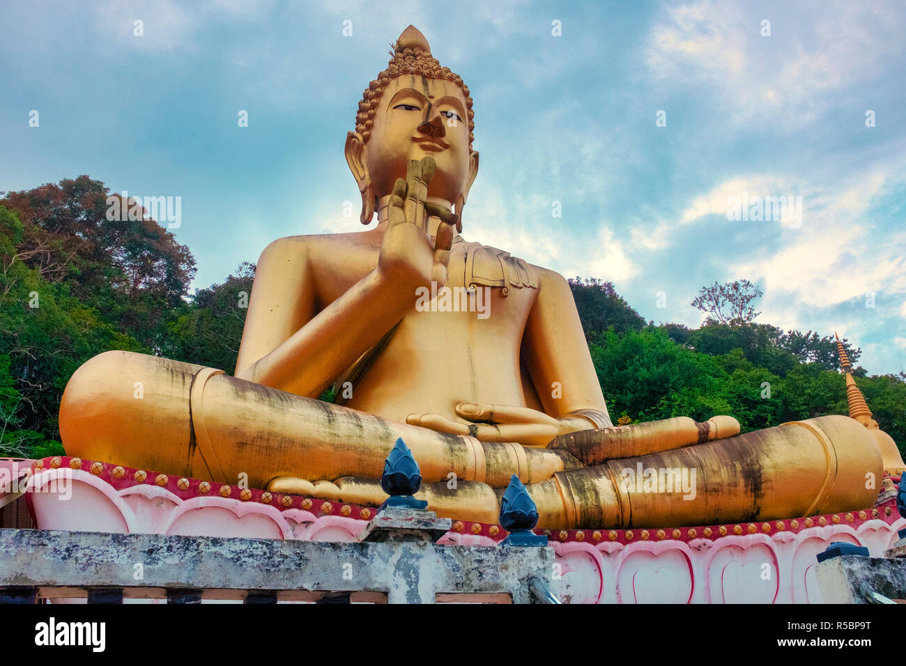 Giant golden Buddha in Wat Kao Rang, Phuket Town, Thailand Stock Photo