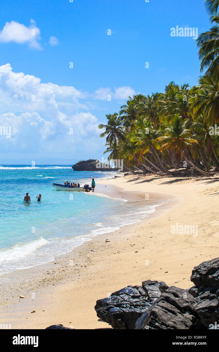 Dominican Republic, Samana Peninsula, Las Galleras, Tourists in boat at Playa Fronton Stock Photo