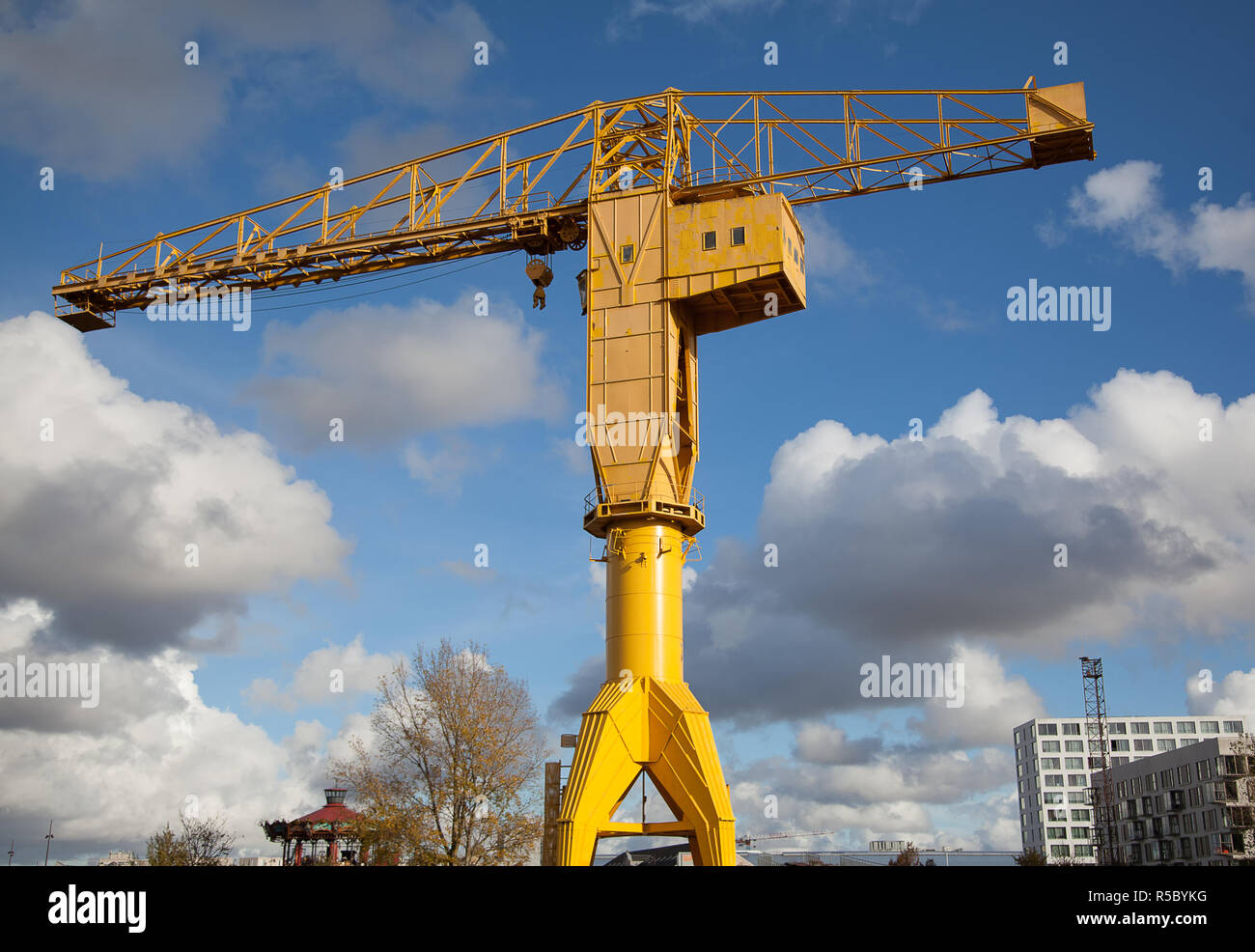 The yellow crane titan in Nantes, France green line tourist attraction in a sunny day whit clear sky and clouds Stock Photo