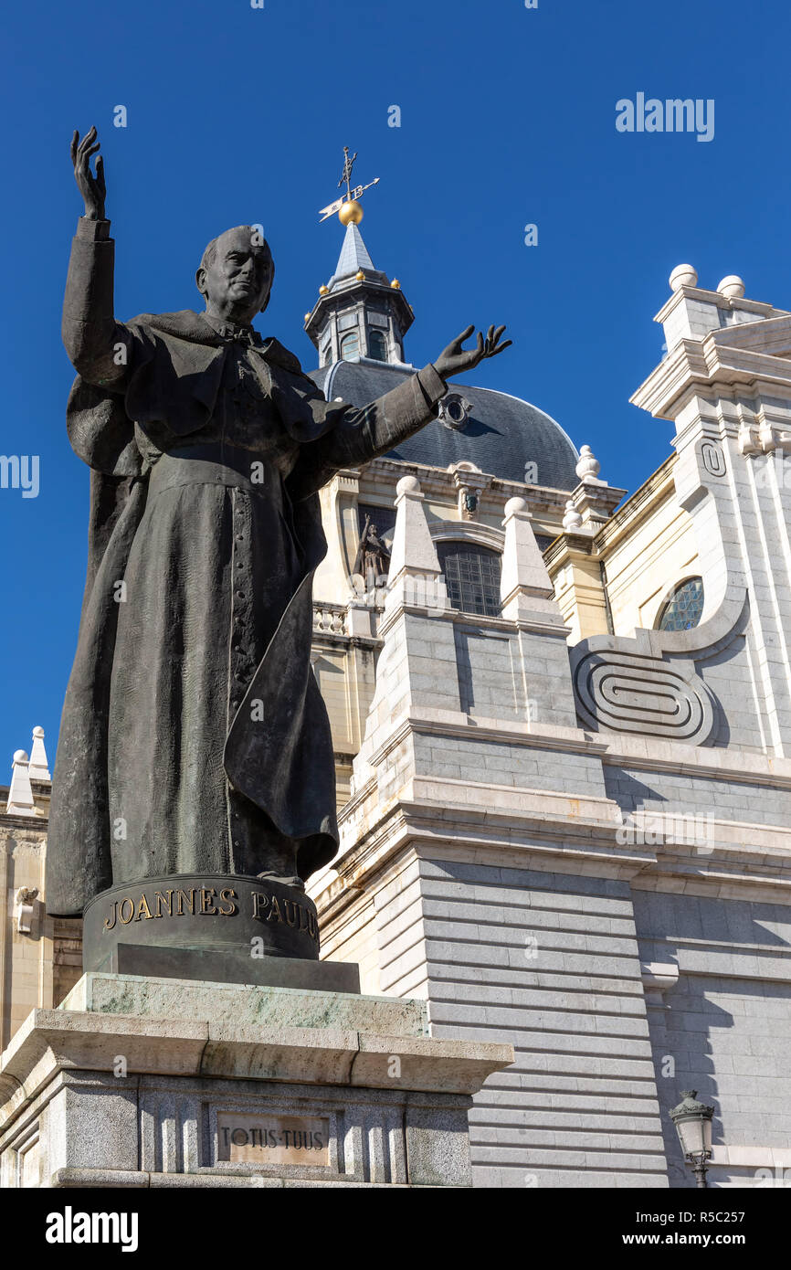 Madrid, Spain - November 29, 2018: The monument of Pope John Paul II. in front of the Almudena Cathedral in the City of Madrid in Spain. Stock Photo