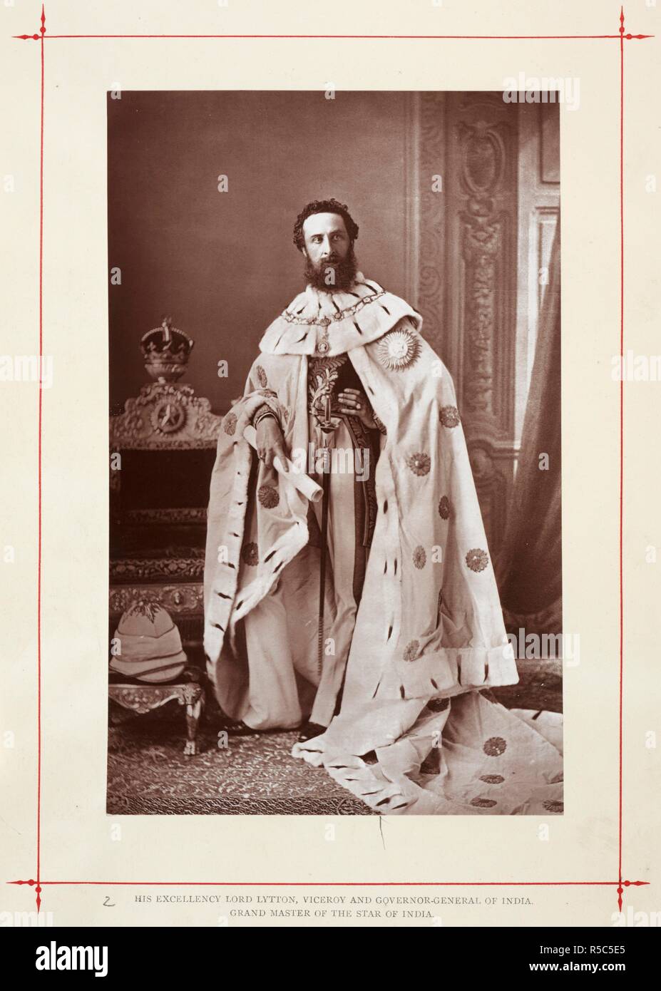 His Excellency Lord Lytton, Viceroy and Governor-General of India. Grand Master of the Star of India. A full-length standing portrait of Lord Lytton, wearing Viceregal robes and the order of the Star of India, probably photographed at Government House, Calcutta. J. Talboys Wheeler, 'The History of the Imperial Assemblage at Delhi' (Longmans, London, [1877]). c. 1876. Photograph. Source: Photo 1054/(2). Language: English. Author: BOURNE AND SHEPHERD. Stock Photo
