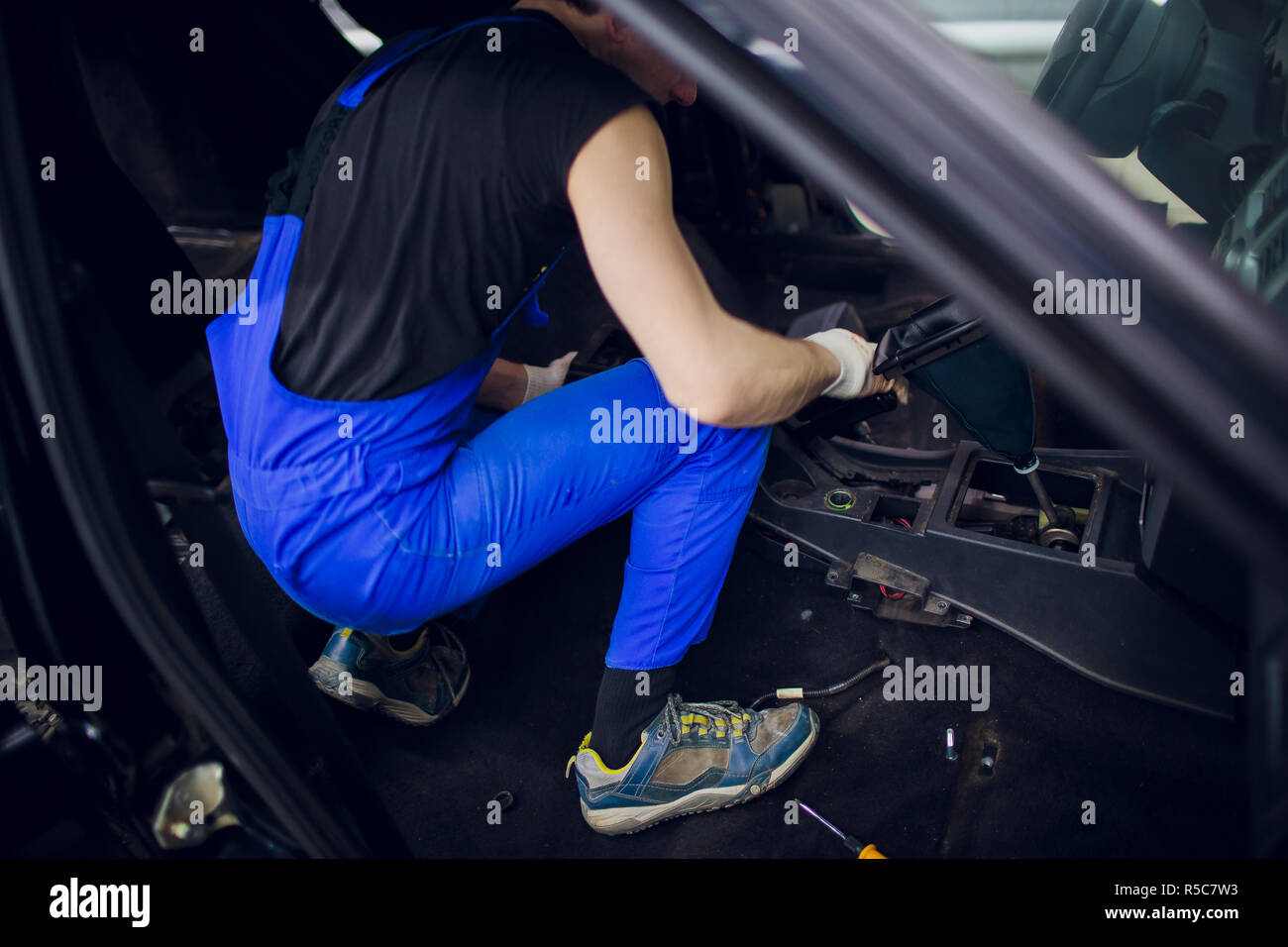 close up part of a car automatic gear lever, gear shift, dismantling