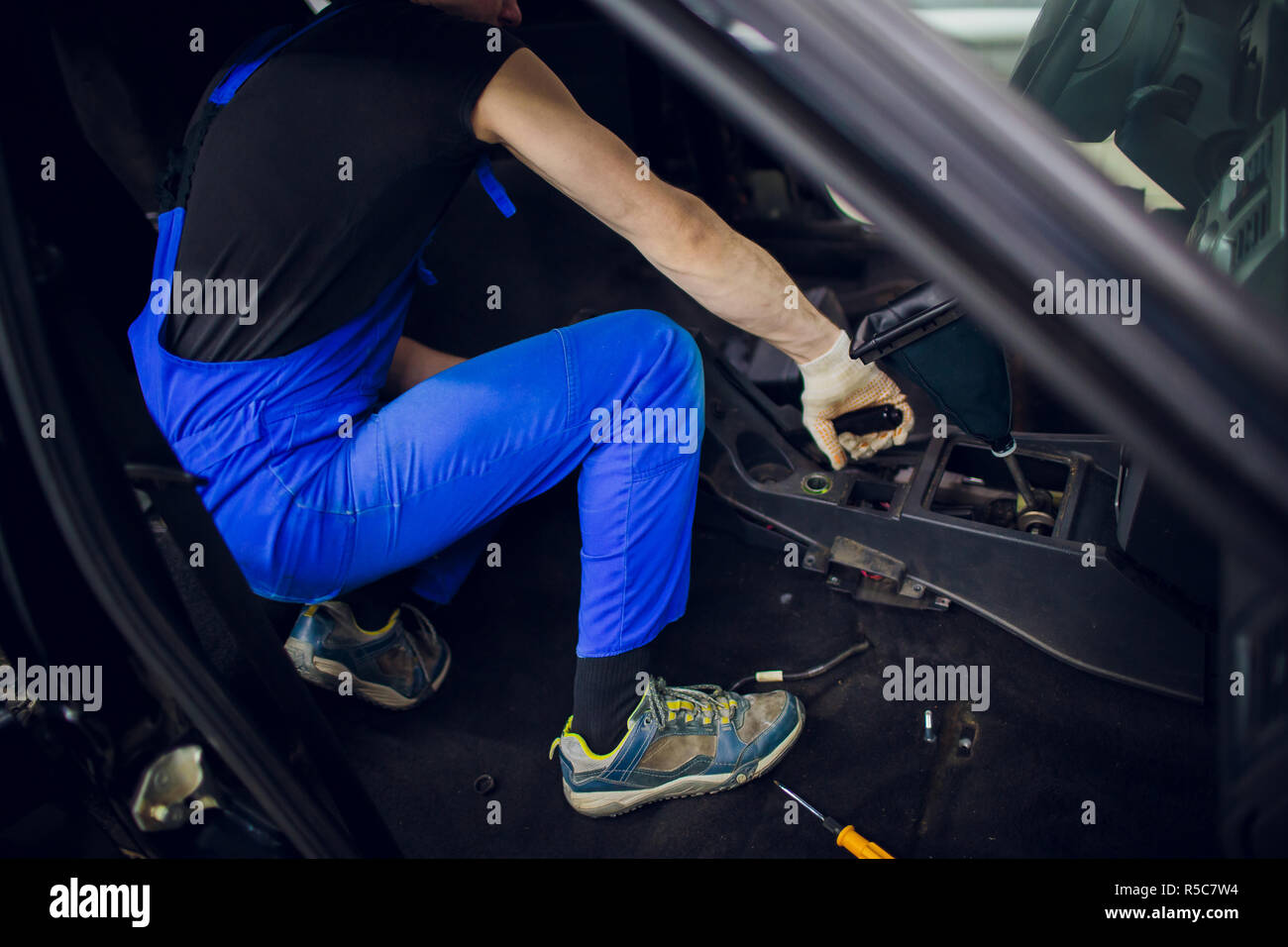 close up part of a car automatic gear lever, gear shift, dismantling