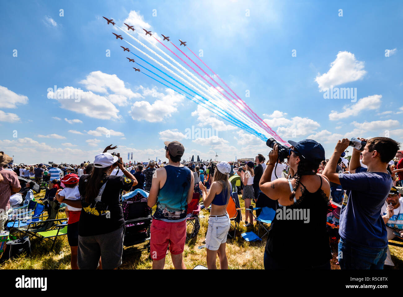 Royal Air Force RAF Red Arrows arriving over the crowd at the Royal