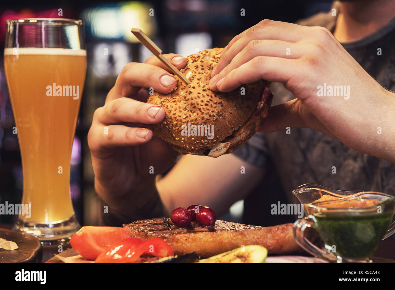 Man Eating Burgers Stock Photo Alamy