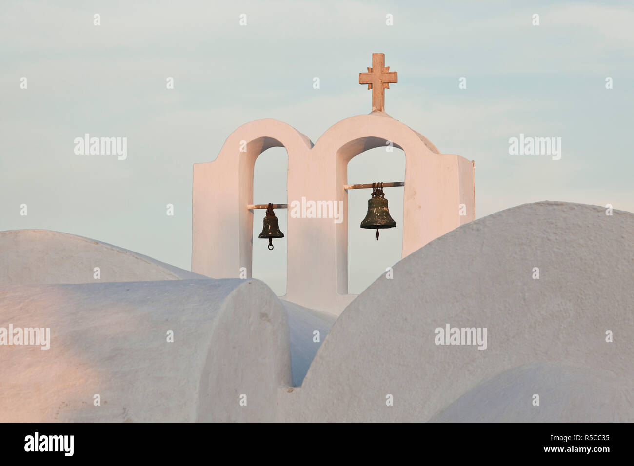 Church bells, Oia, Santorini, Cyclades islands, Greece Stock Photo