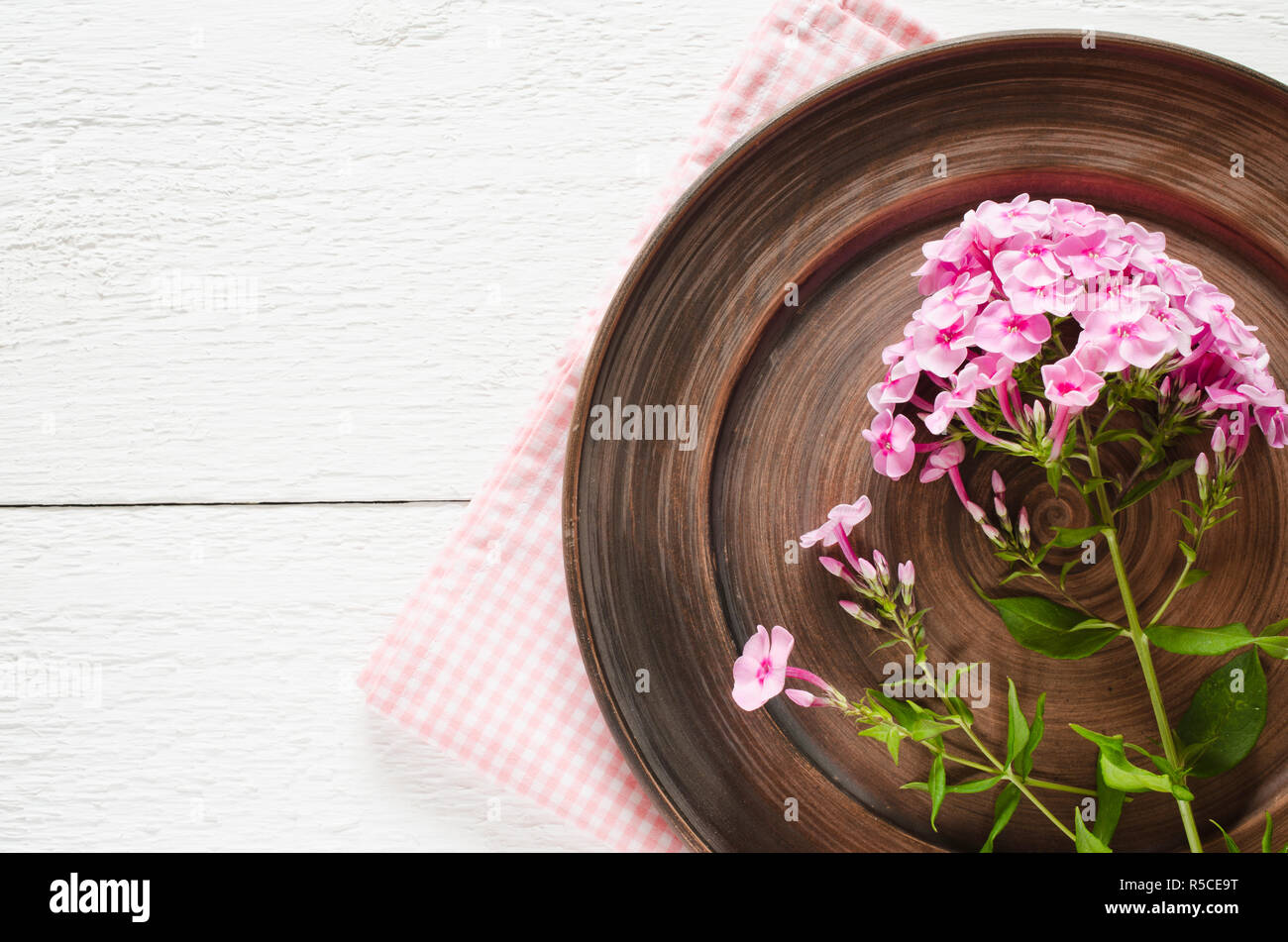 Spring table settings with fresh flower. Holidays background. Selective Focus. Stock Photo