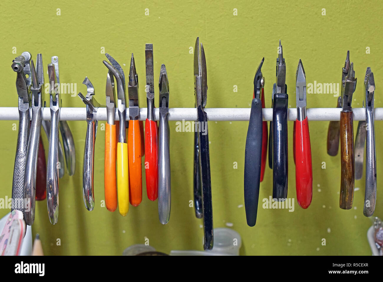 Various small pliers craft tools at rail Stock Photo Alamy