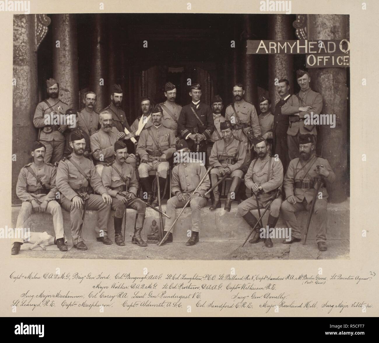 A group portrait of General Prendergast and many of his staff, taken in  front of the Hall of Audience in Mandalay Palace, on 17th December, 1885.  'Burmah. A series of one hundred