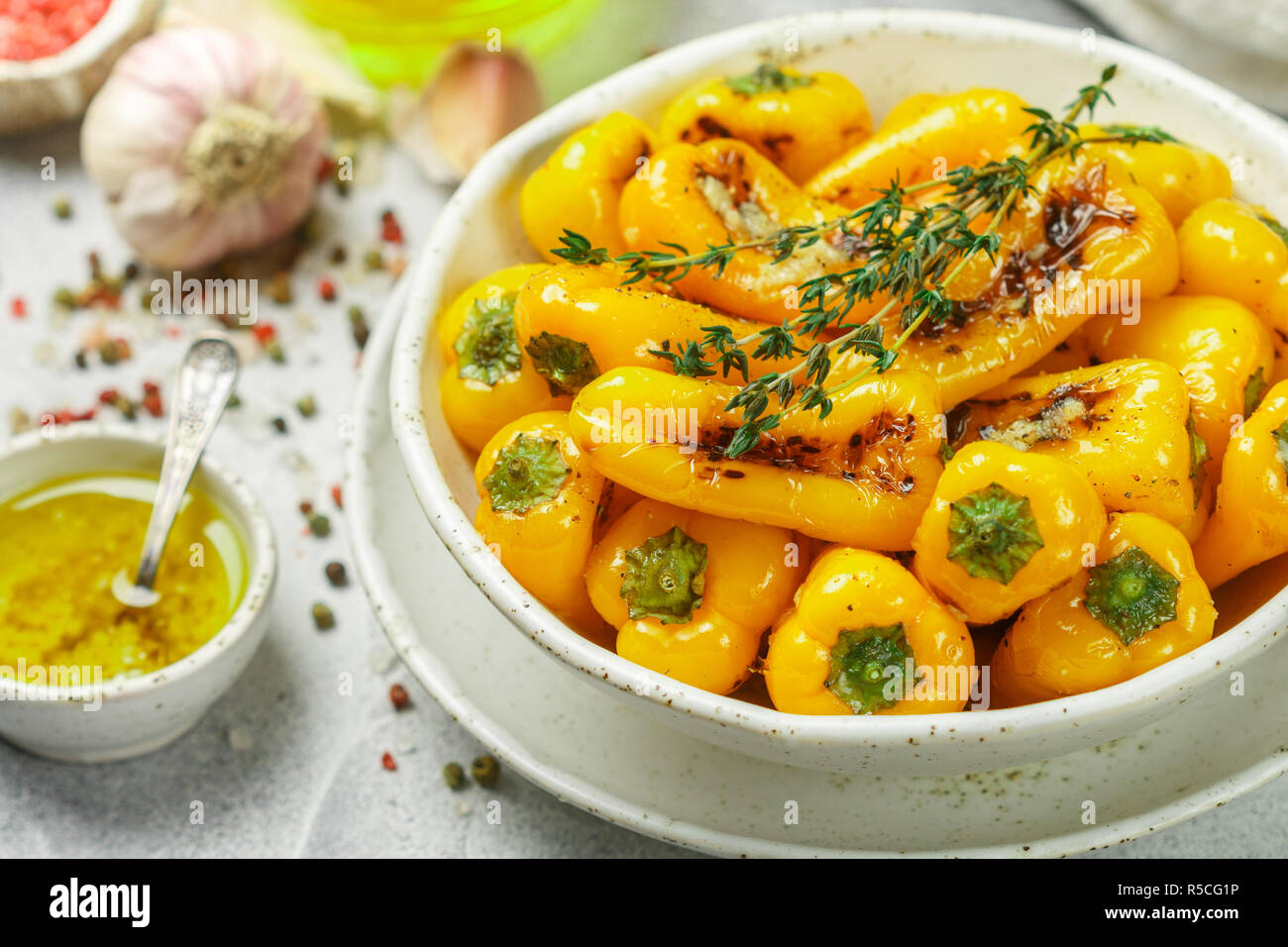 Delicatessen appetizer of roasted bell peppers with garlic, thyme and
