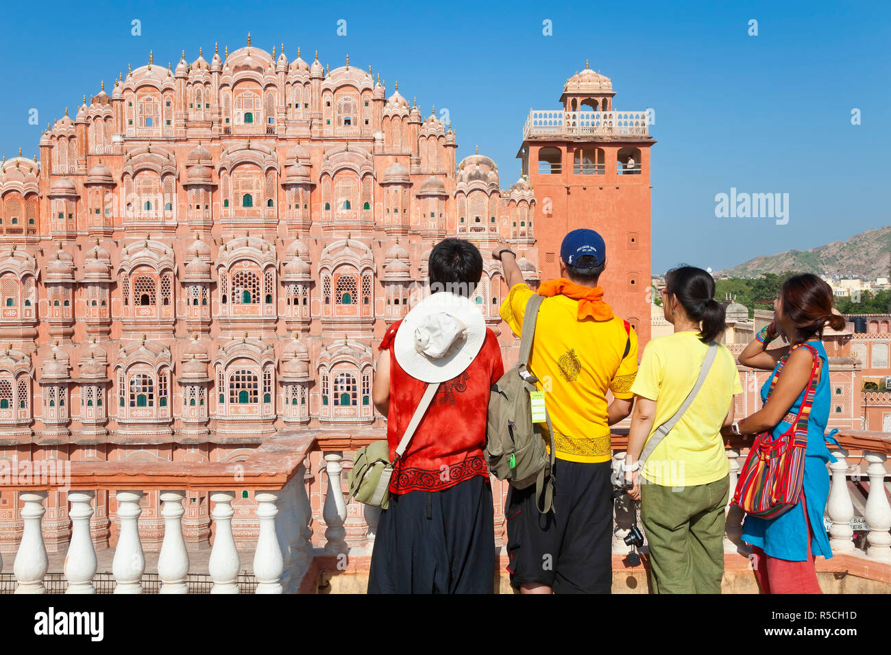 India, Rajasthan, Jaipur, Tourists viewing the Hawa Mahal, Palace of the Winds, built in 1799, (MR) Stock Photo