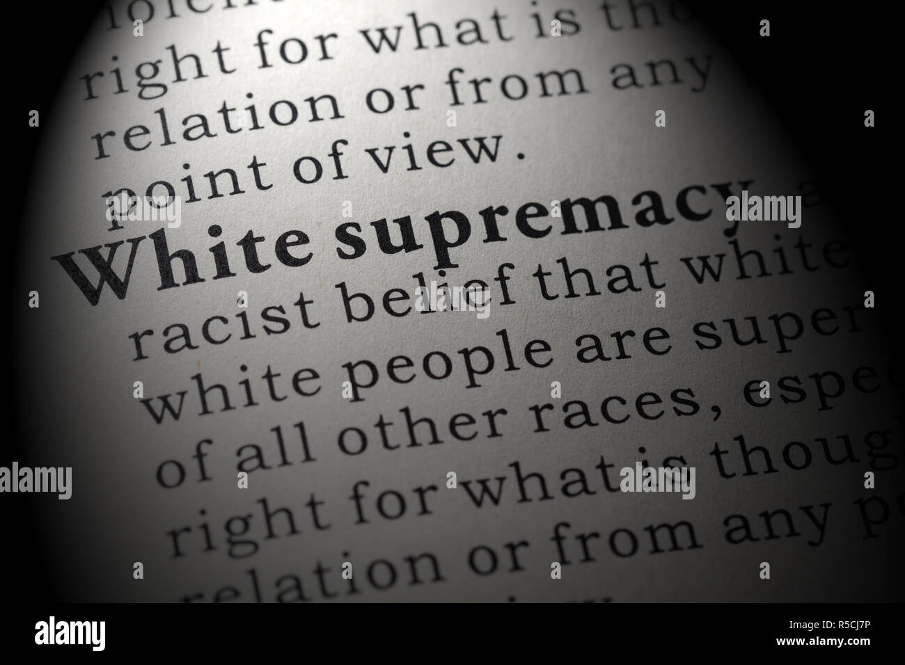 Fake Dictionary, Dictionary definition of the word White supremacy. including key descriptive words. Stock Photo
