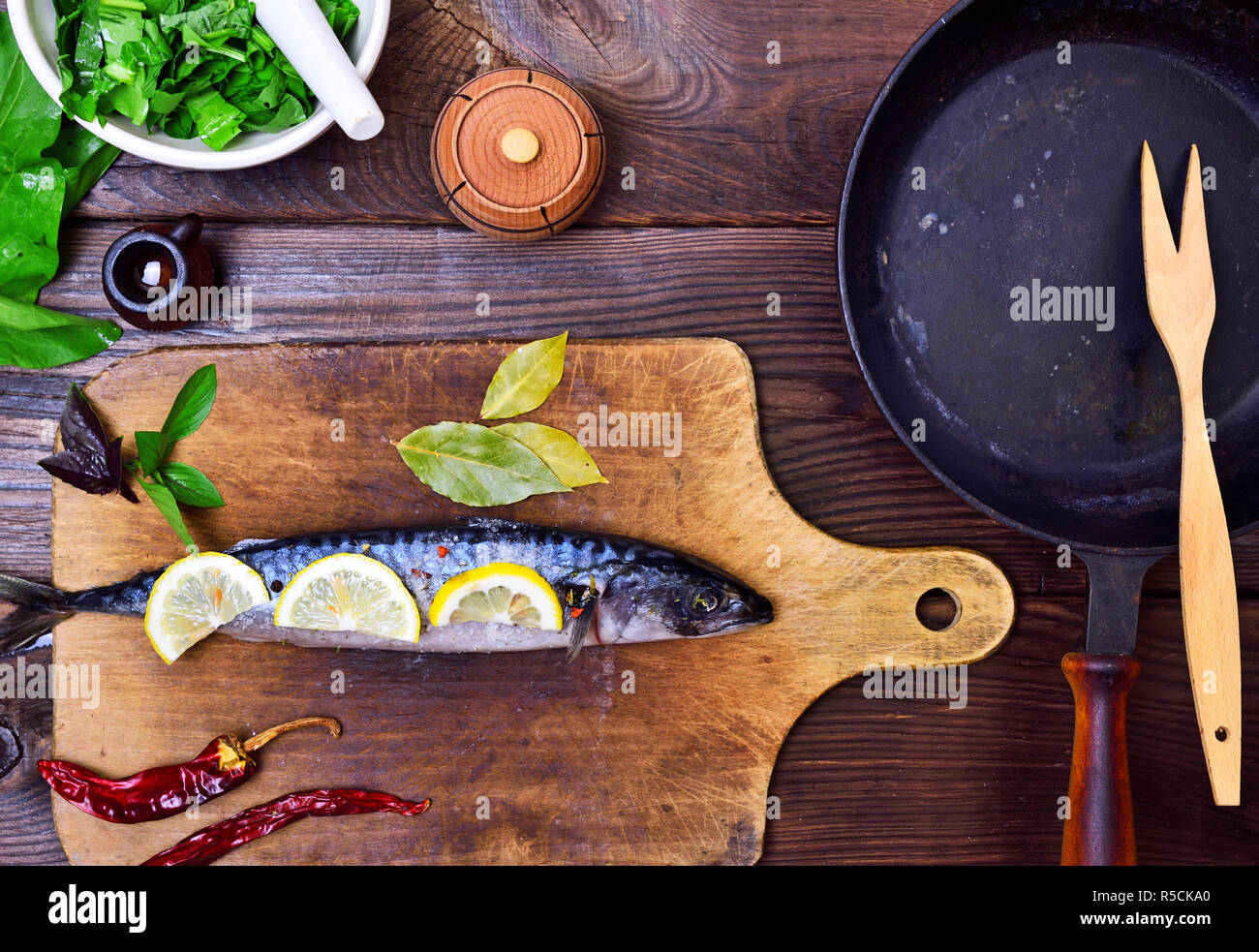 mackerel on a wooden kitchen board Stock Photo