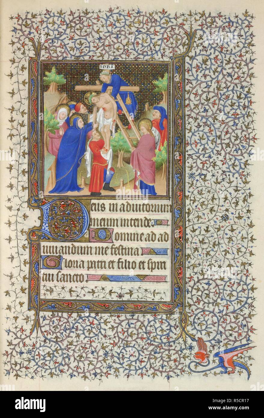 Miniature of the Deposition of Christ, with an illuminated initial 'D'(eus), and a full foliate border, at the beginning of the Hours of the Cross. Book of Hours, Use of Paris. France, Central (Paris); c. 1410 - c. 1420. Source: Yates Thompson 46, f.133. Language: Latin and French. Stock Photo